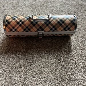 Plaid Wine Holder perfect for safely transporting your wine to the next party.